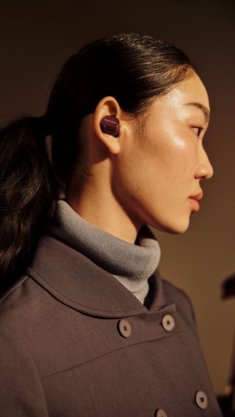 Hear the playlist - woman wearing earbuds