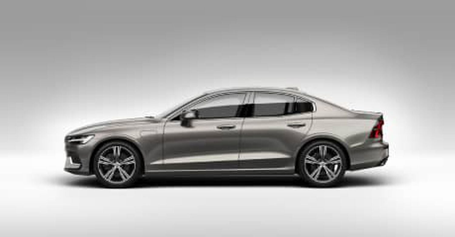 Gold Volvo S60 car left facing with grey shadow background