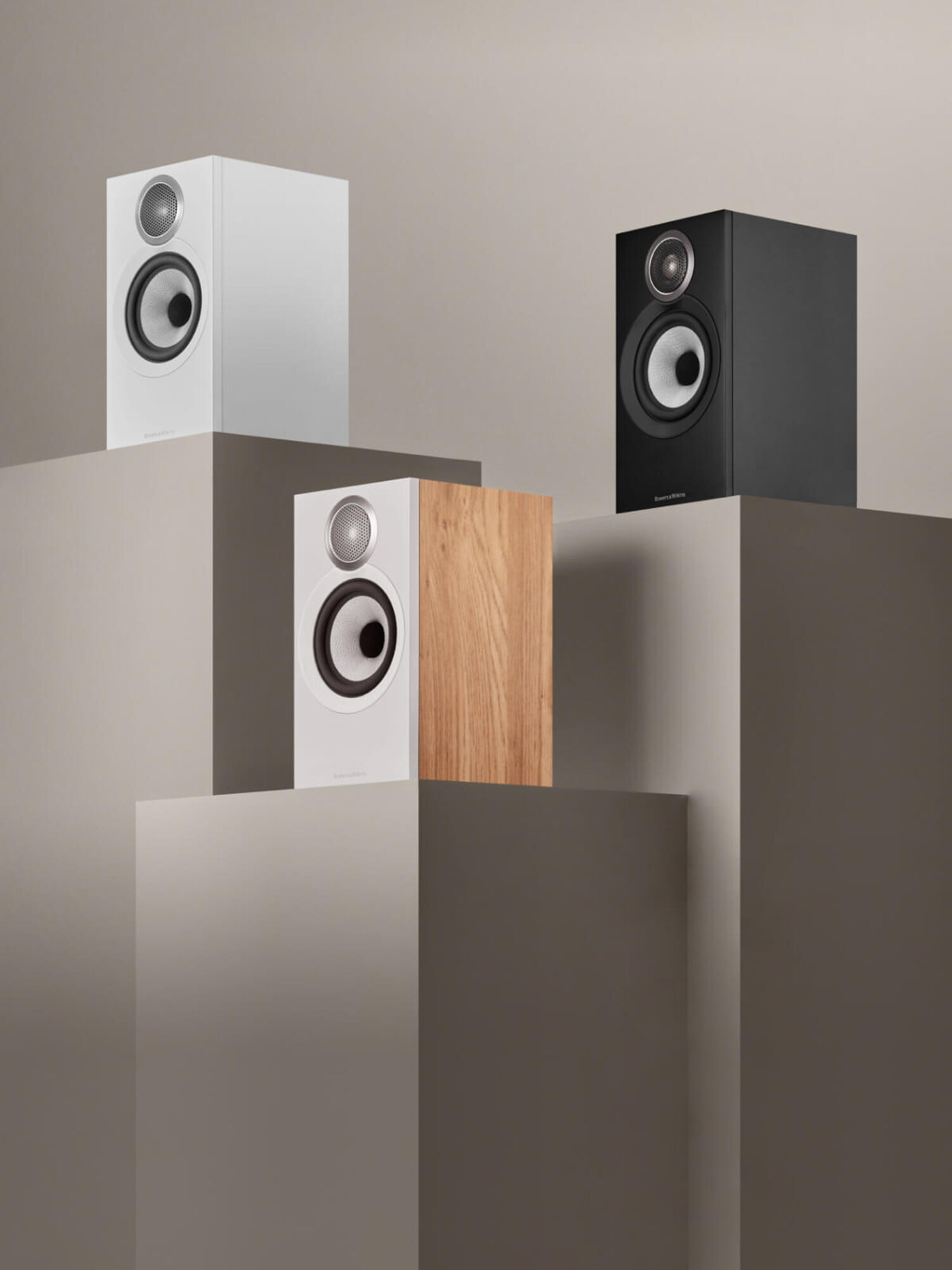 Three 600 Series Speakers Facing Diagonally Left at different heights