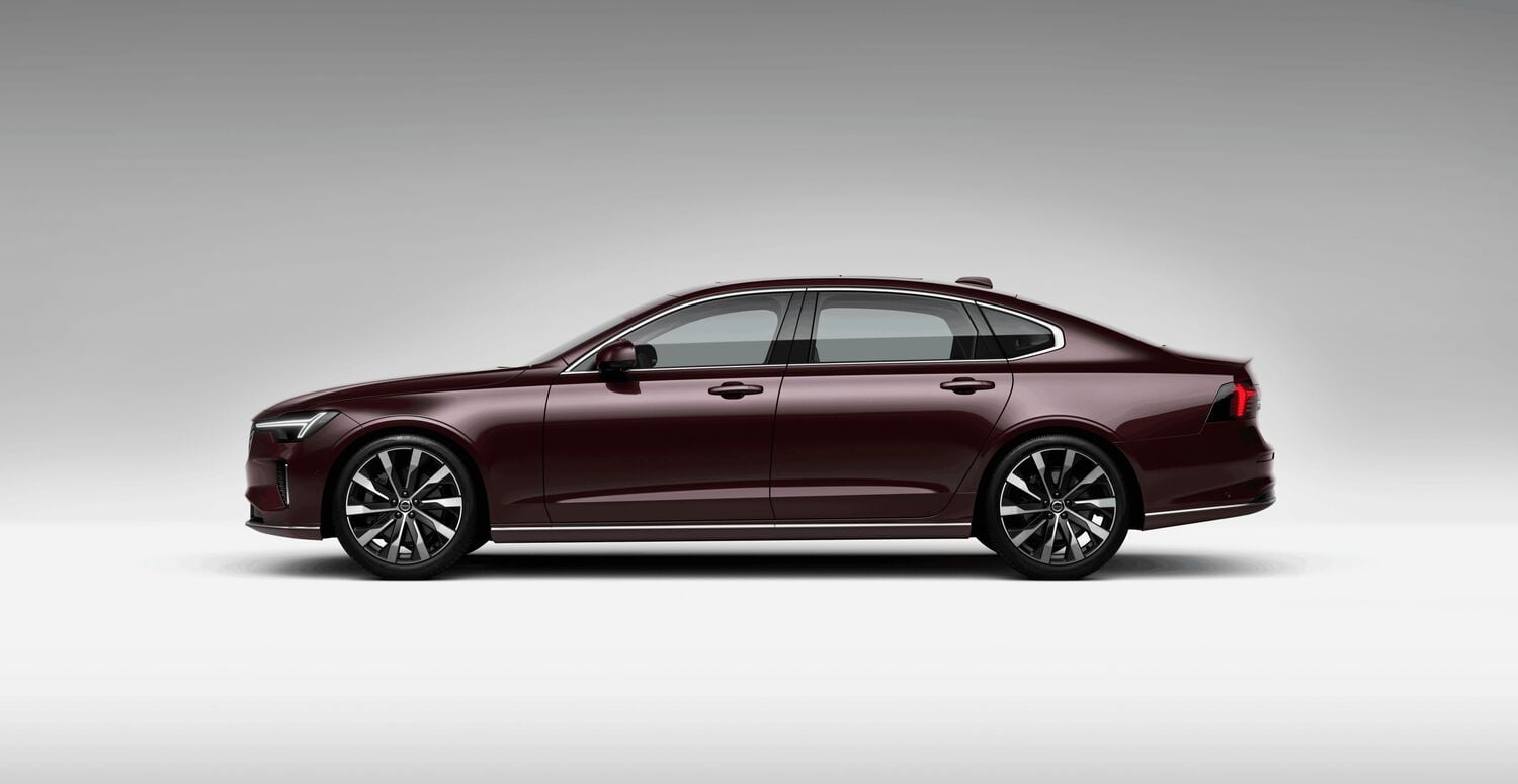 Maroon Volvo S90 car left facing with grey shadow background