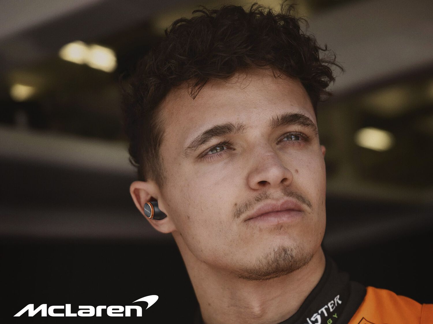 Man facing diagonal right wearing Pi8 McLaren Edition