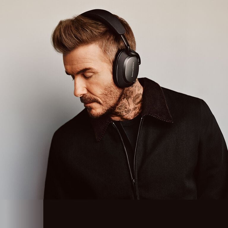 David Beckham wearing Px7 S3 over-ear headphones