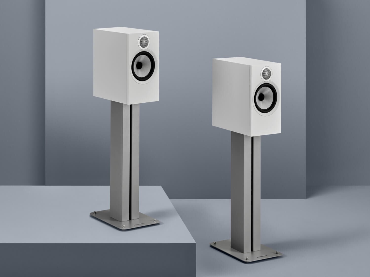 2 White 600 Series facing right with blue background