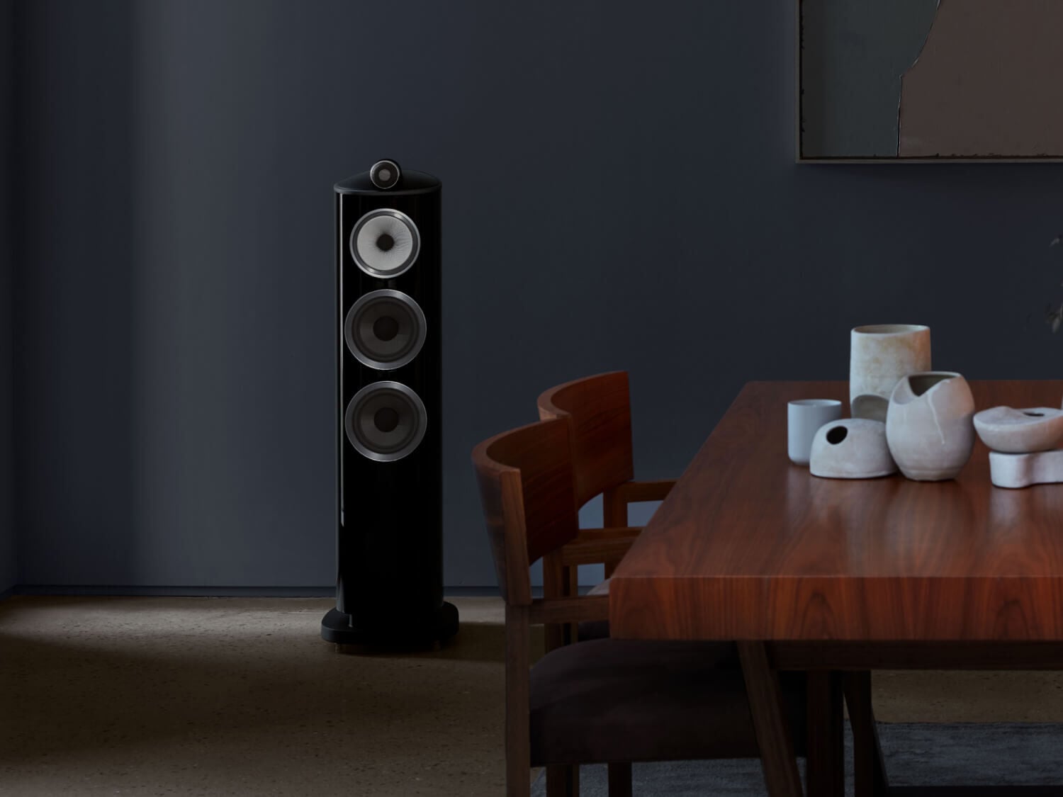 One black 804 D4 next to a brown table