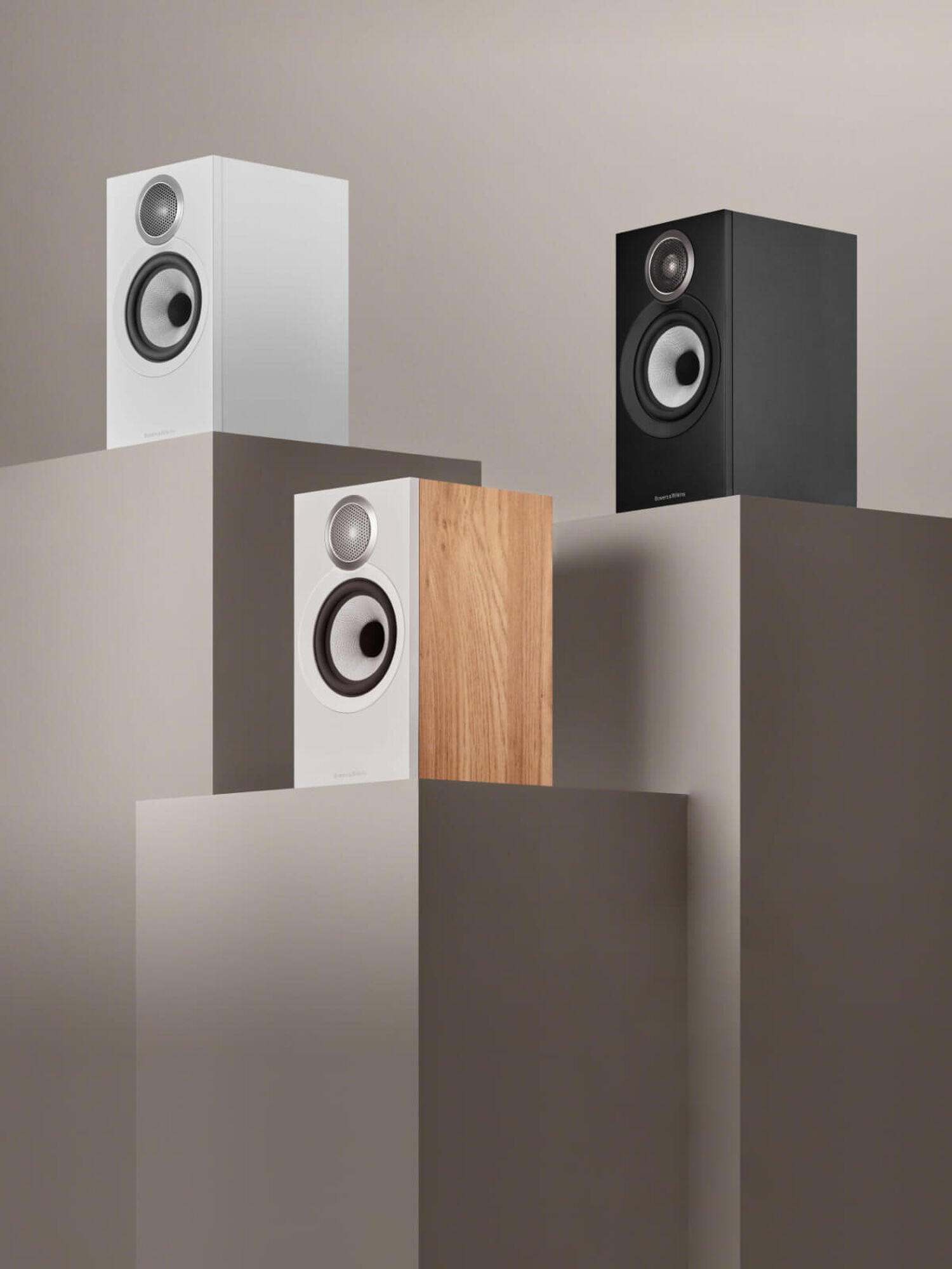 Three 600 Series Speakers Facing Diagonally Left at different heights