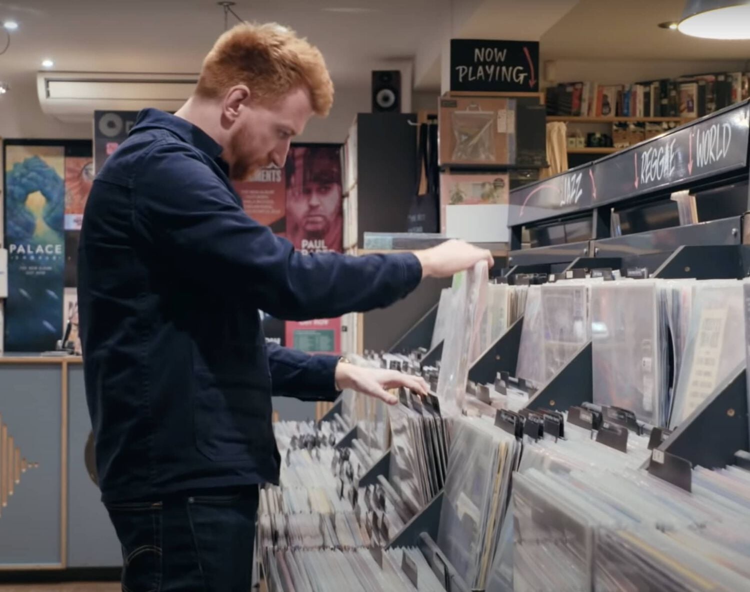Man Shopping at Record Store