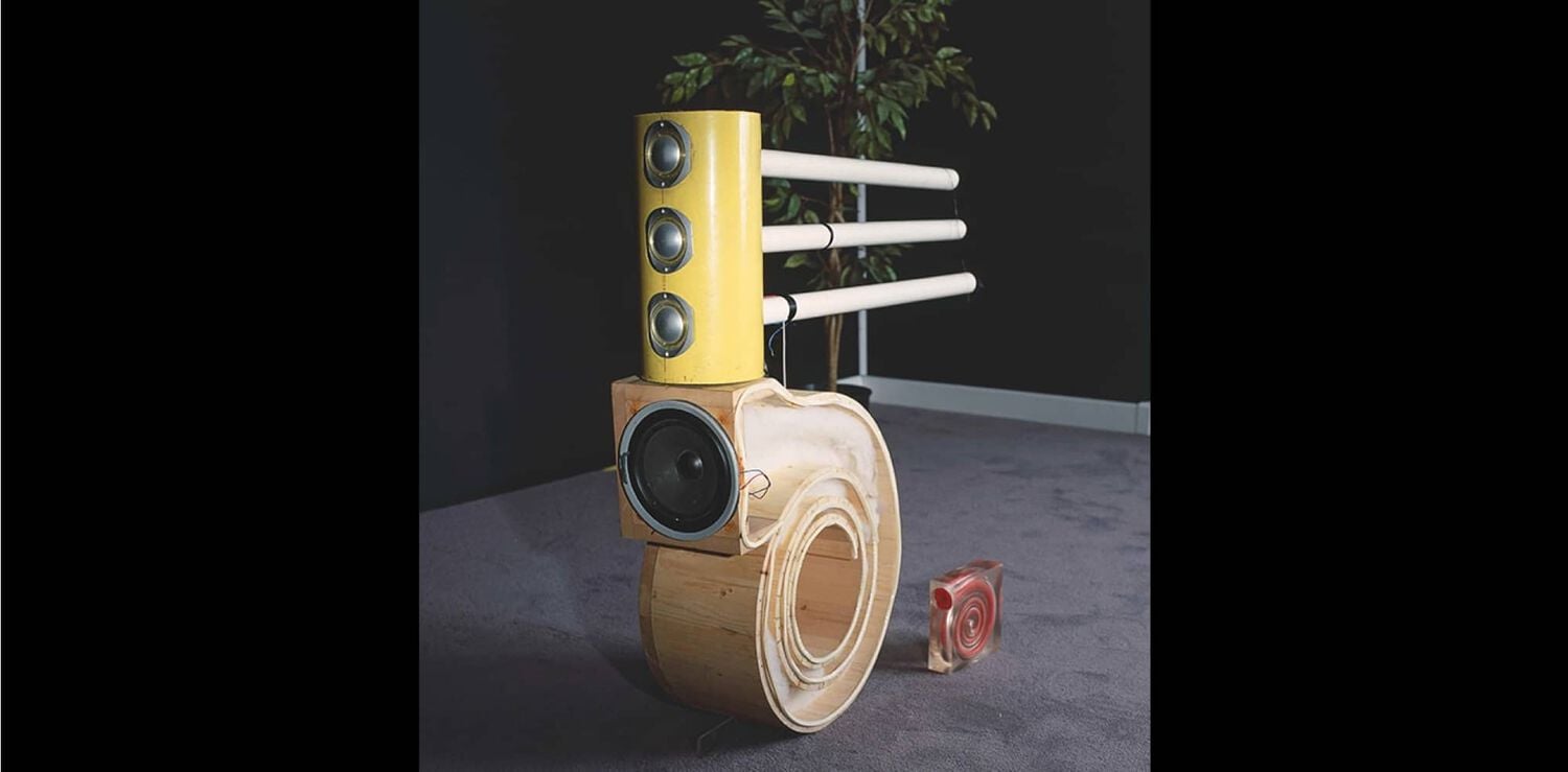 Wood and plastic structure with speakers exposed