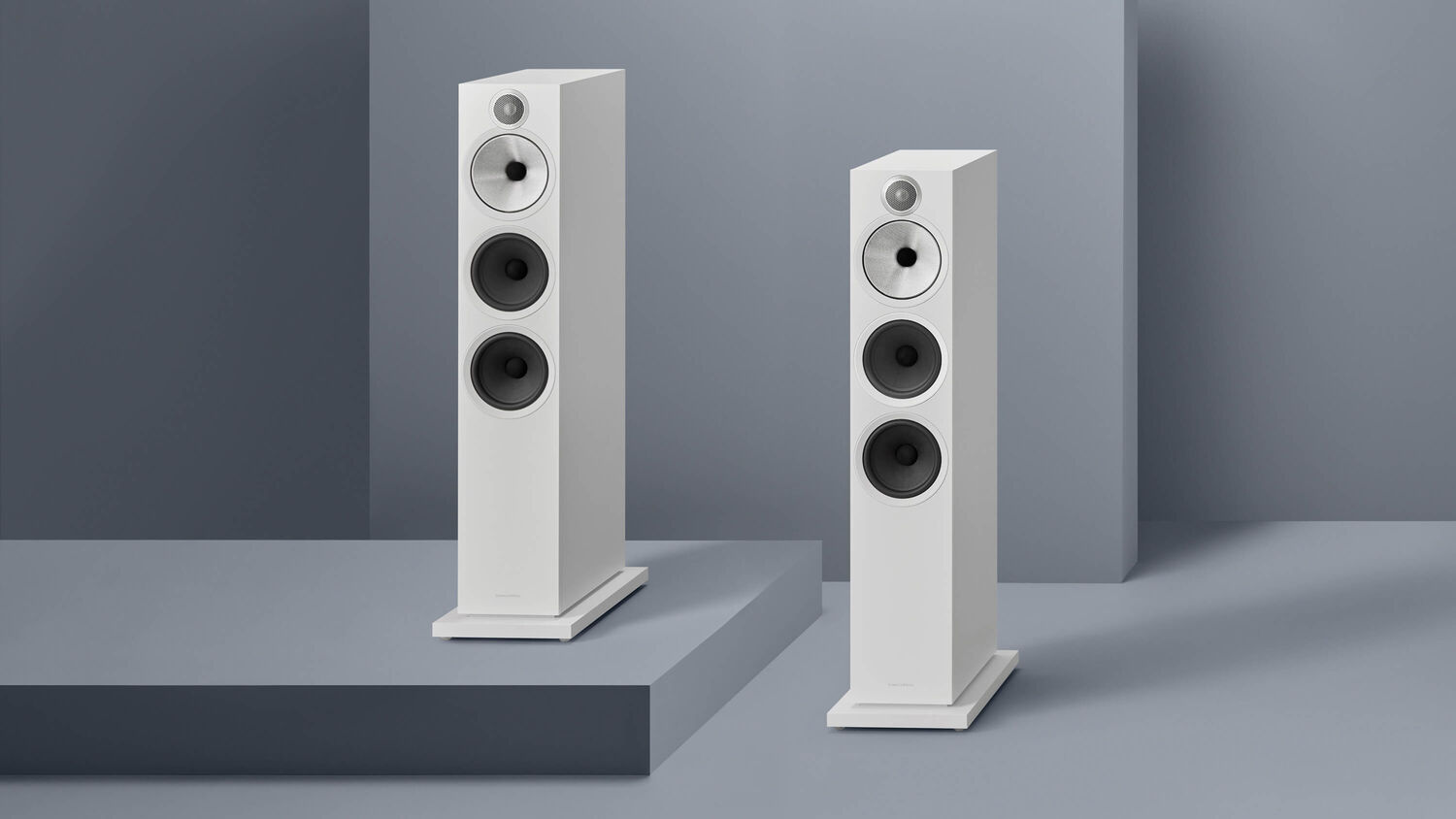 Two white 603 S3 loudspeakers