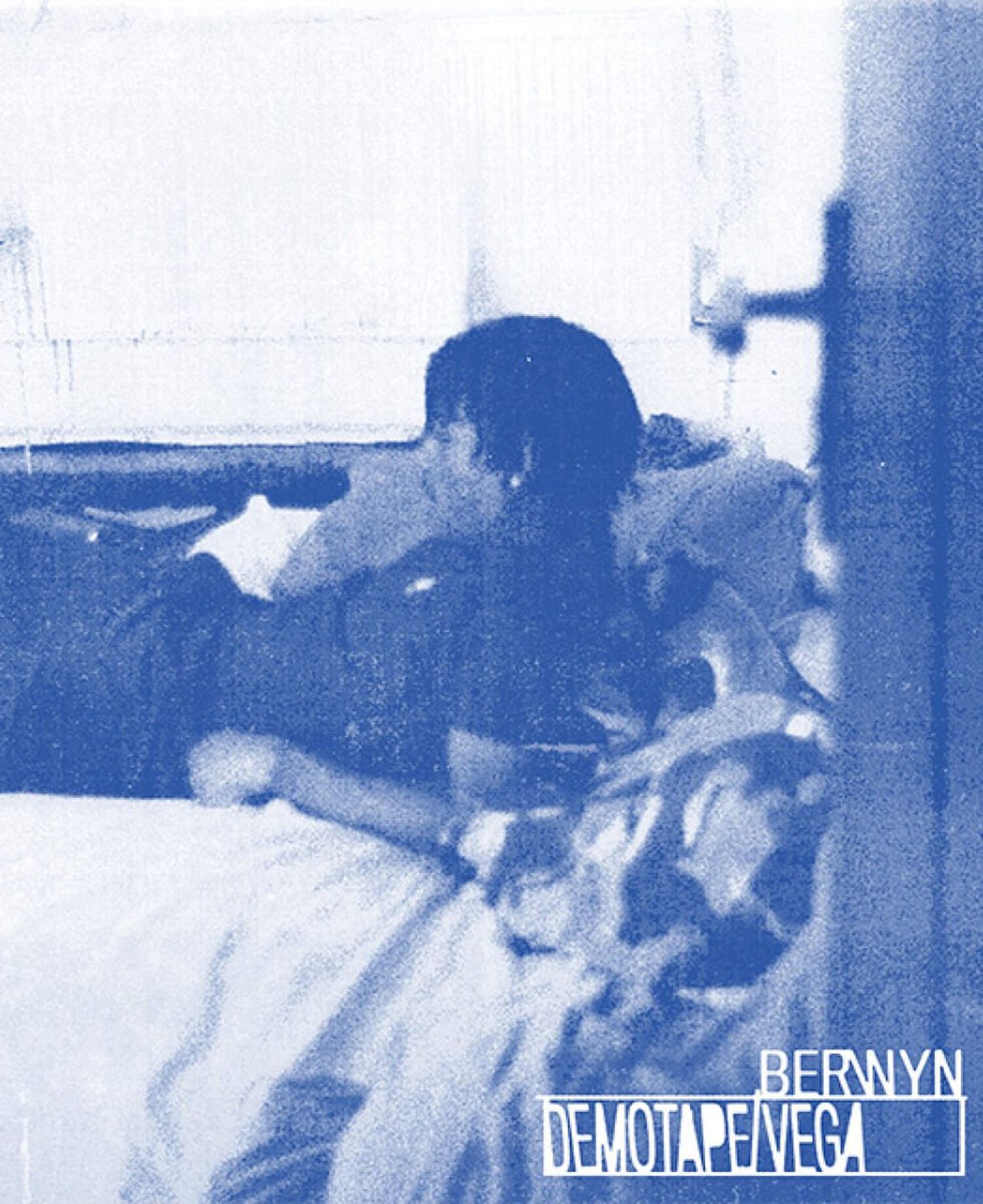 Man resting in bed with blue filter