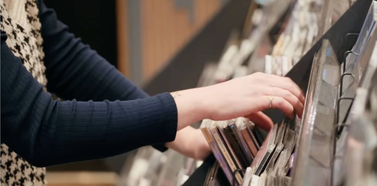 Hands sifting through records