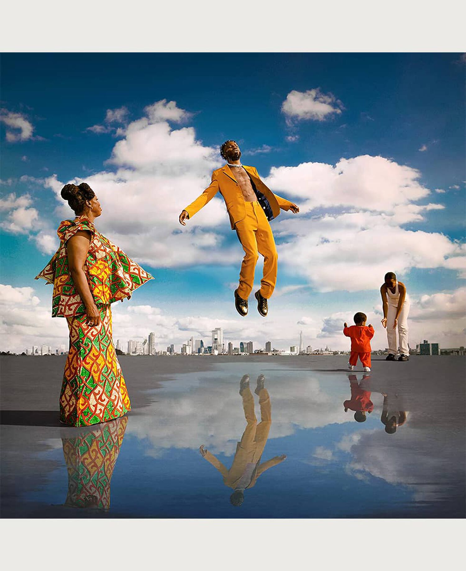3 adults and  1 child in lot of city. Man in yellow suit is hovering over a puddle of water