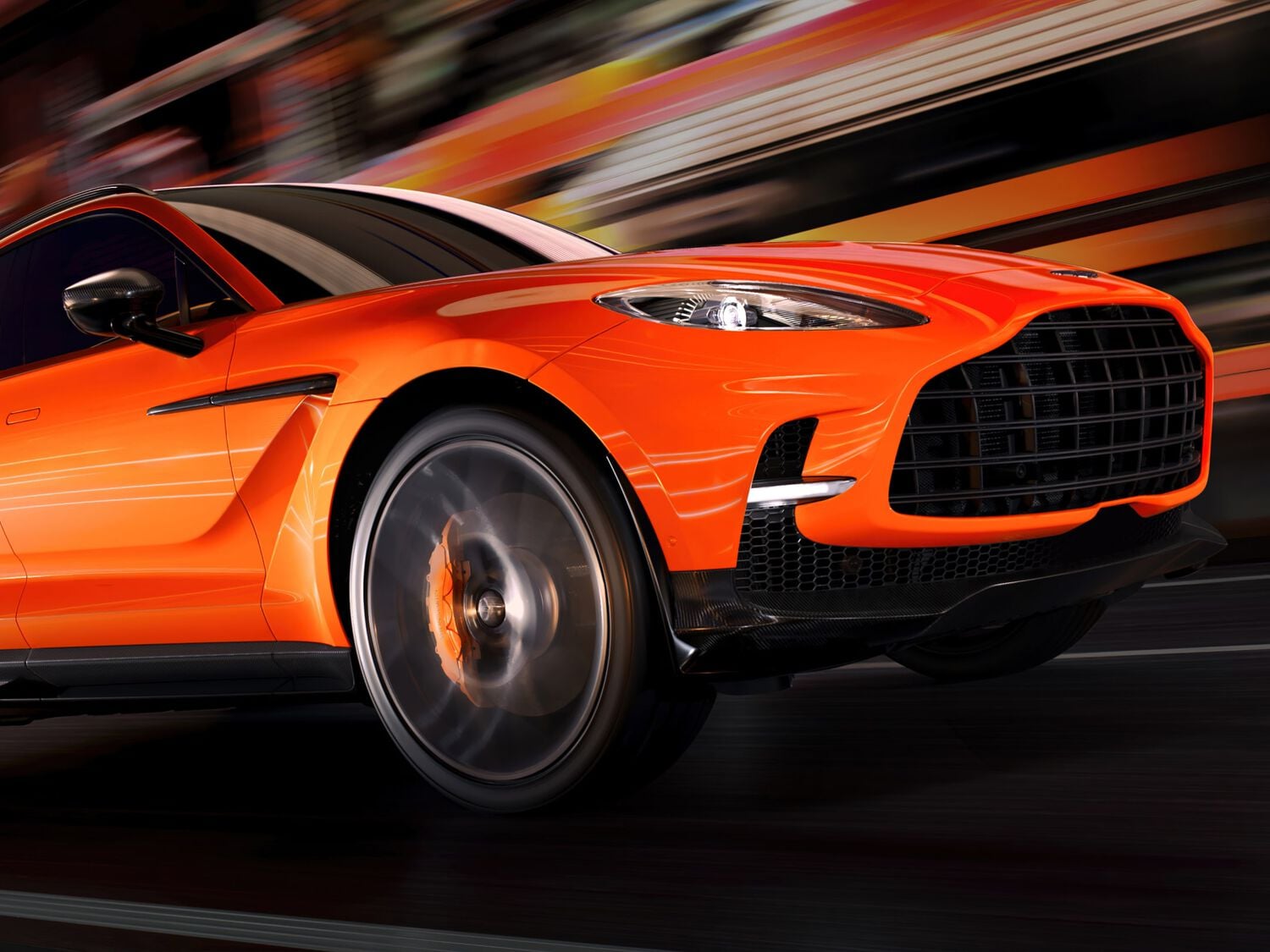 Aston Martin DBX707 orange going fast