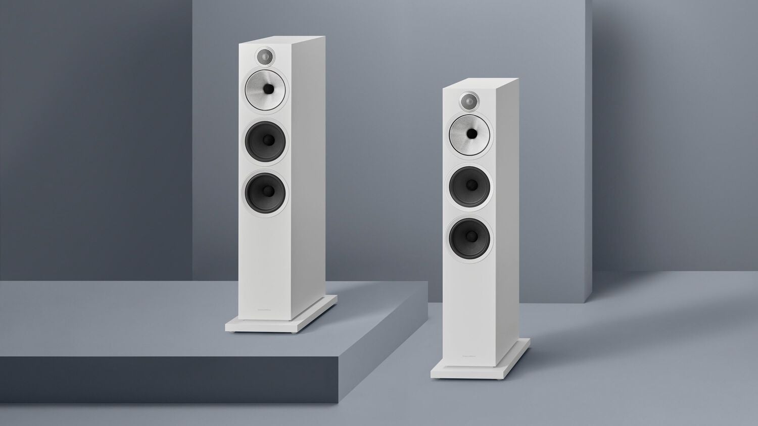 Two white 603 S3 loudspeakers