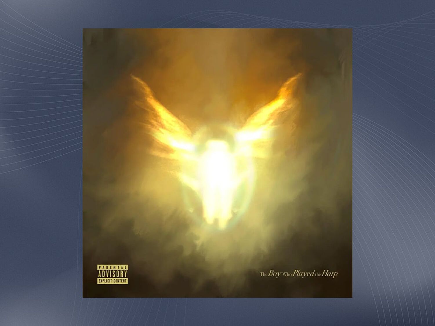 Gold angel figure behind a shadow of smoke