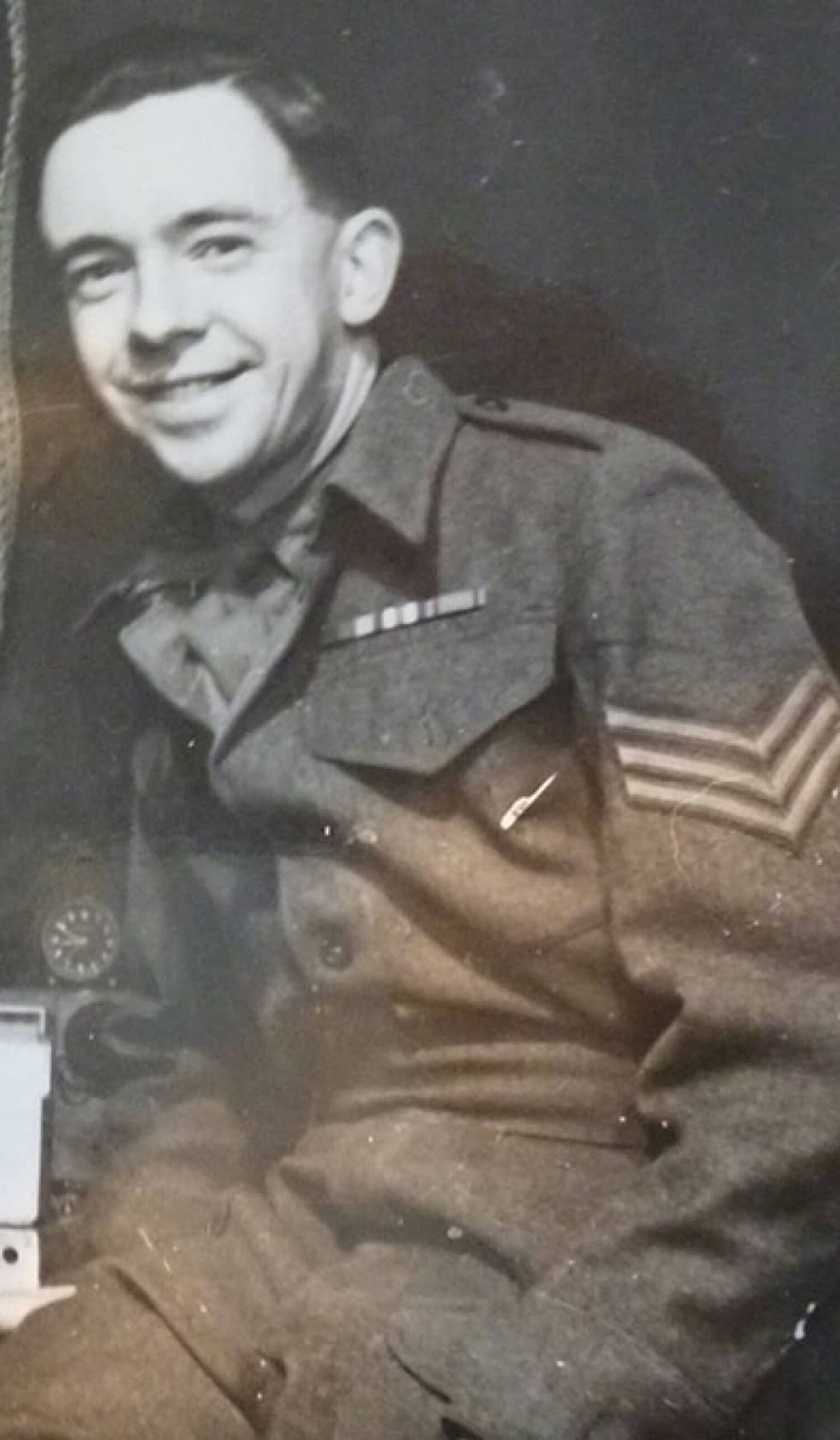 Old black and white photo of man in army uniform