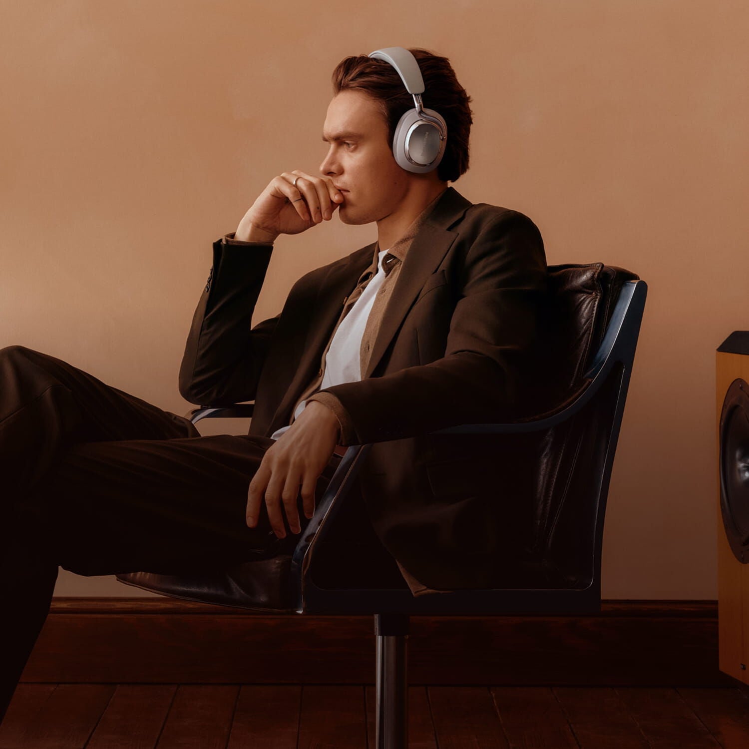 Man wearing Midnight Blue Px8 S2 headphones facing left