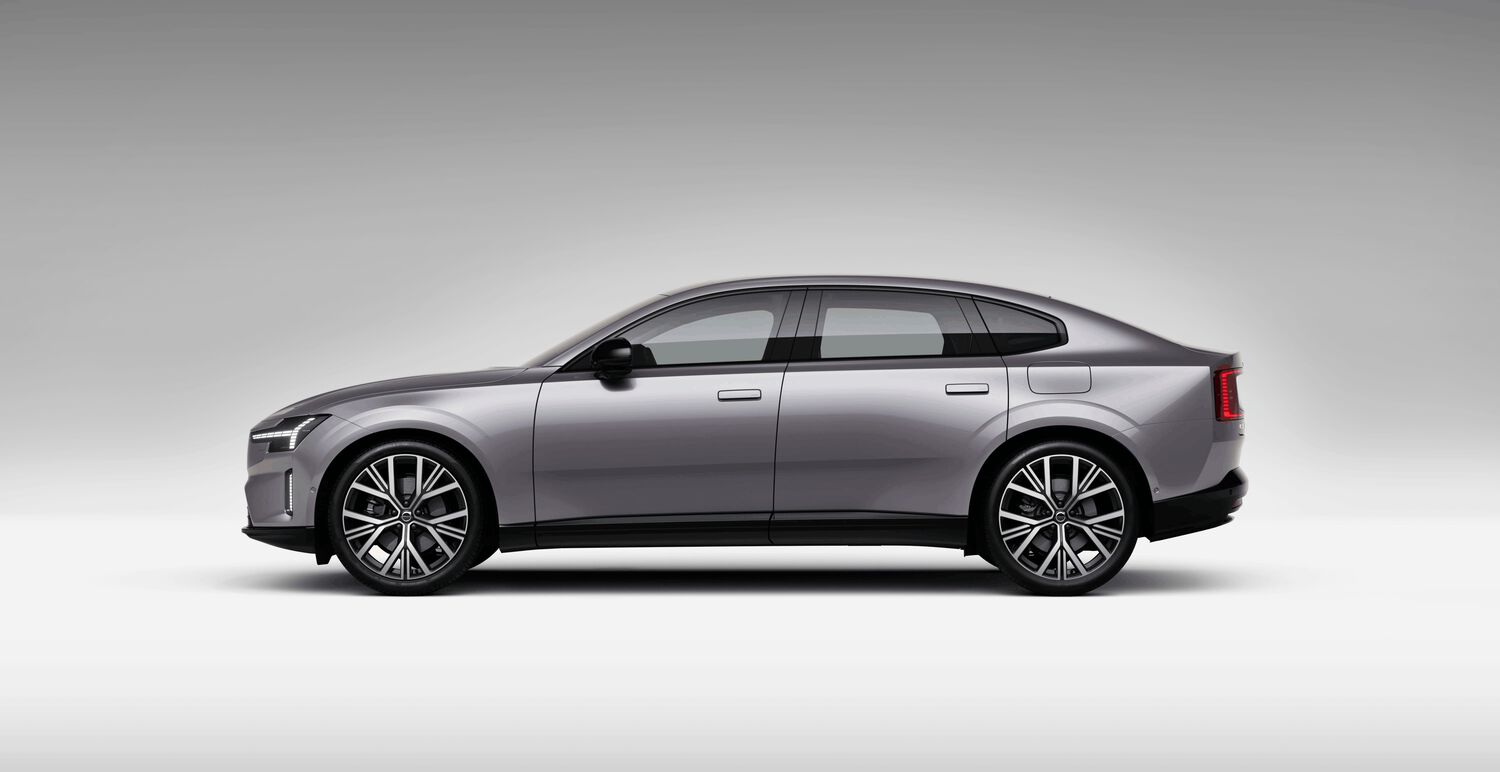 Gray Volvo ES90 car left facing with grey shadow background