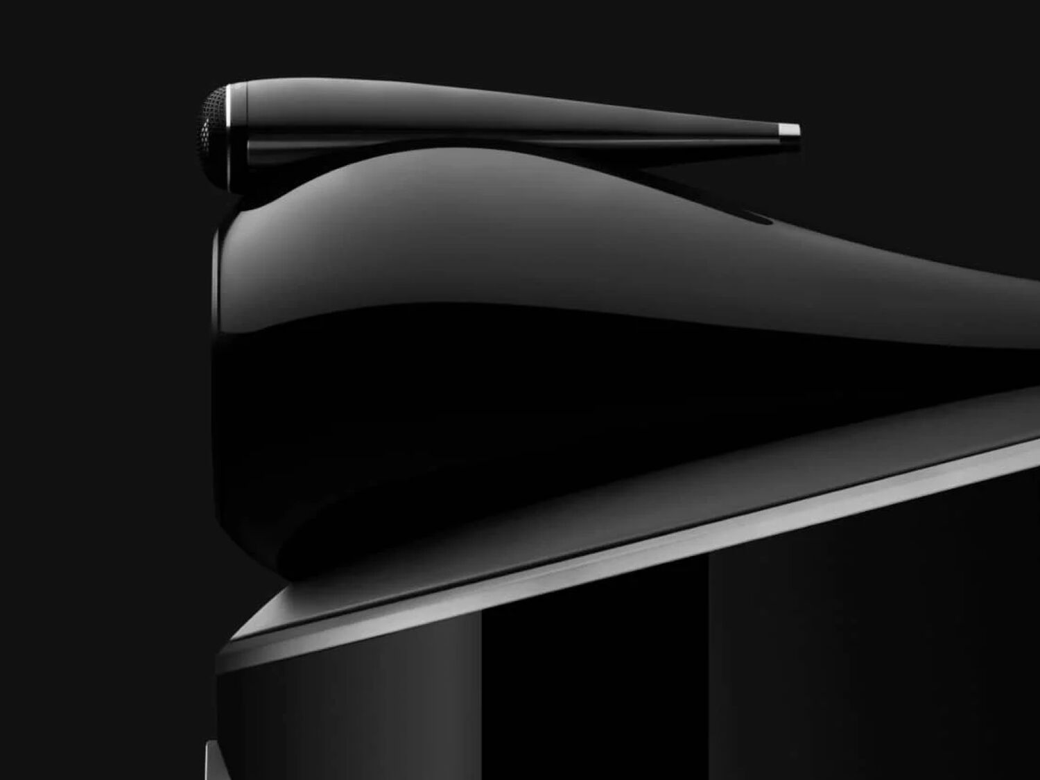 Black speaker facing left
