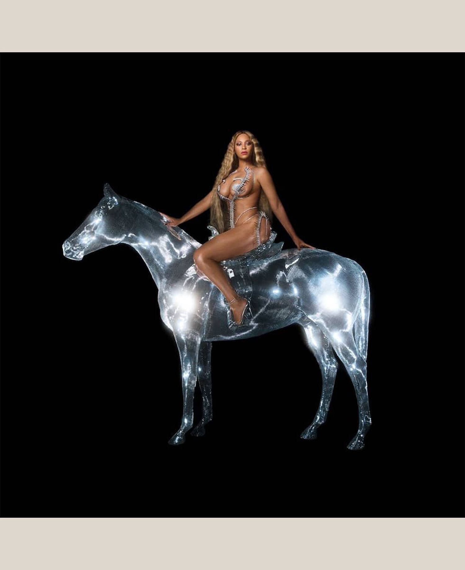 Woman sitting on horse figure with blackground