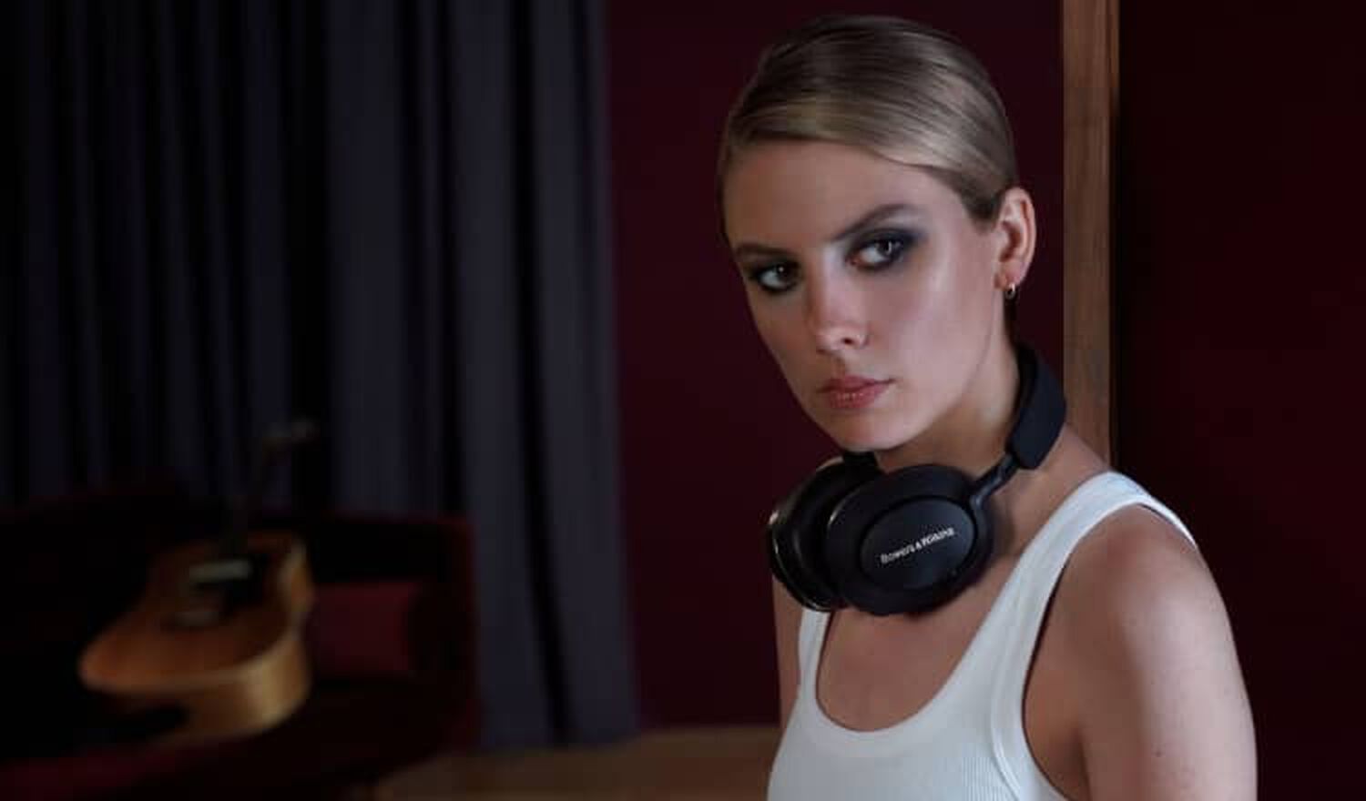 Headphones around woman's neck