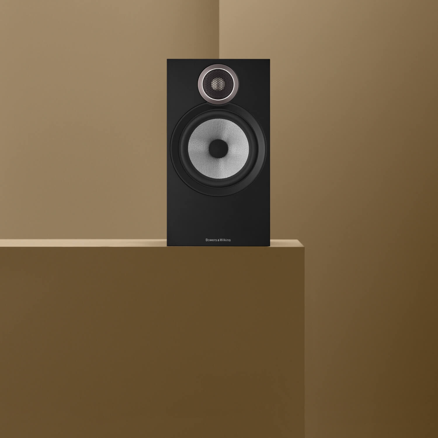 Dedicated to True Sound - one black loudspeaker sitting on a shelf