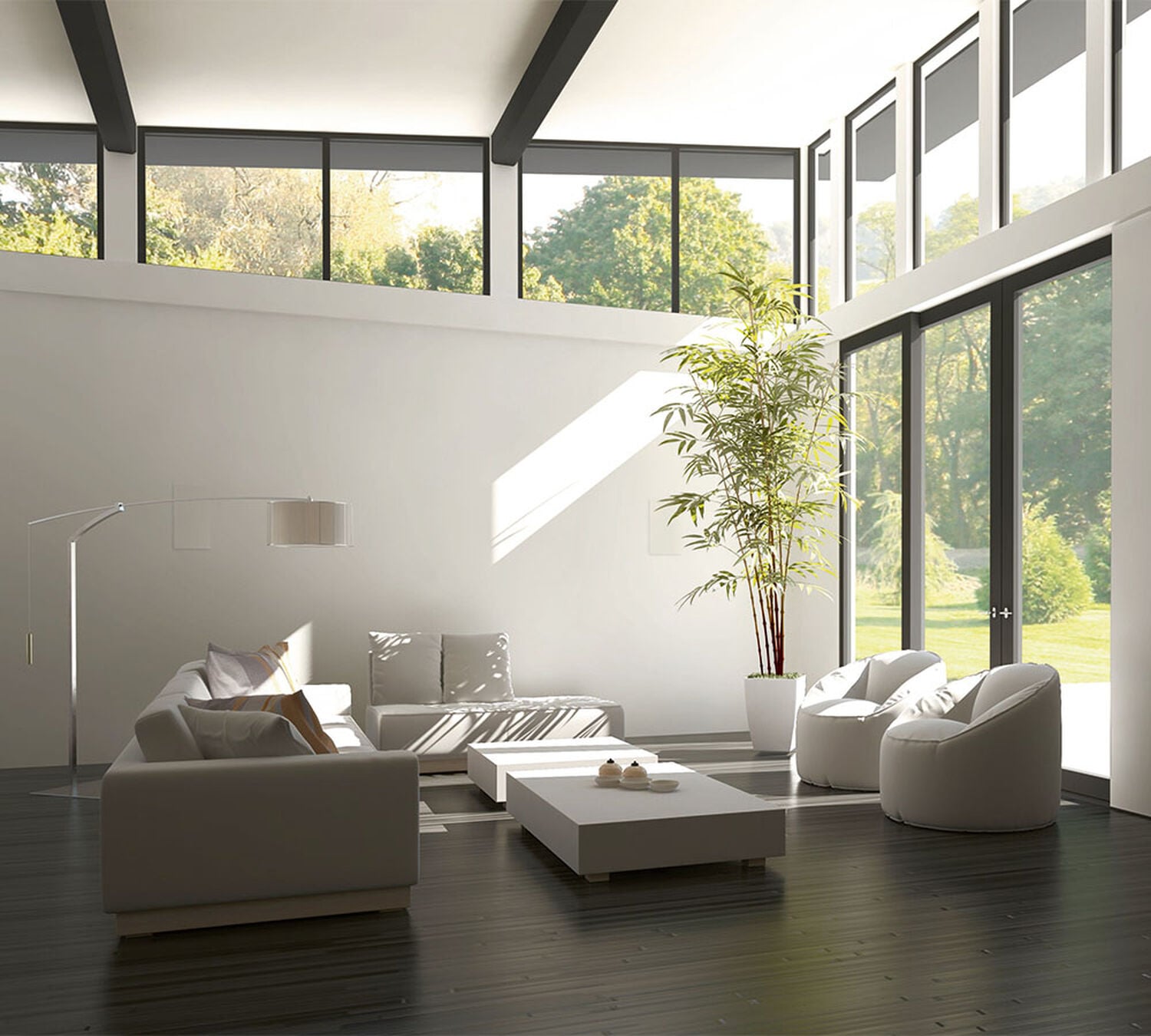 White living room with dark floors and white furniture