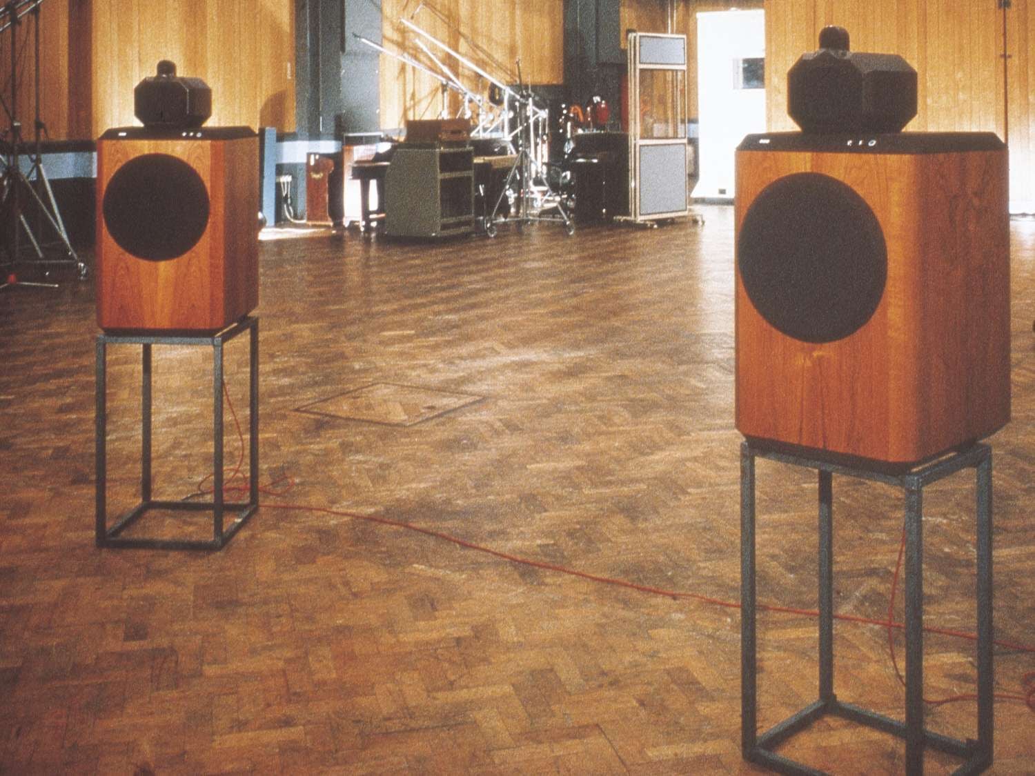 2 old wooden speakers in room