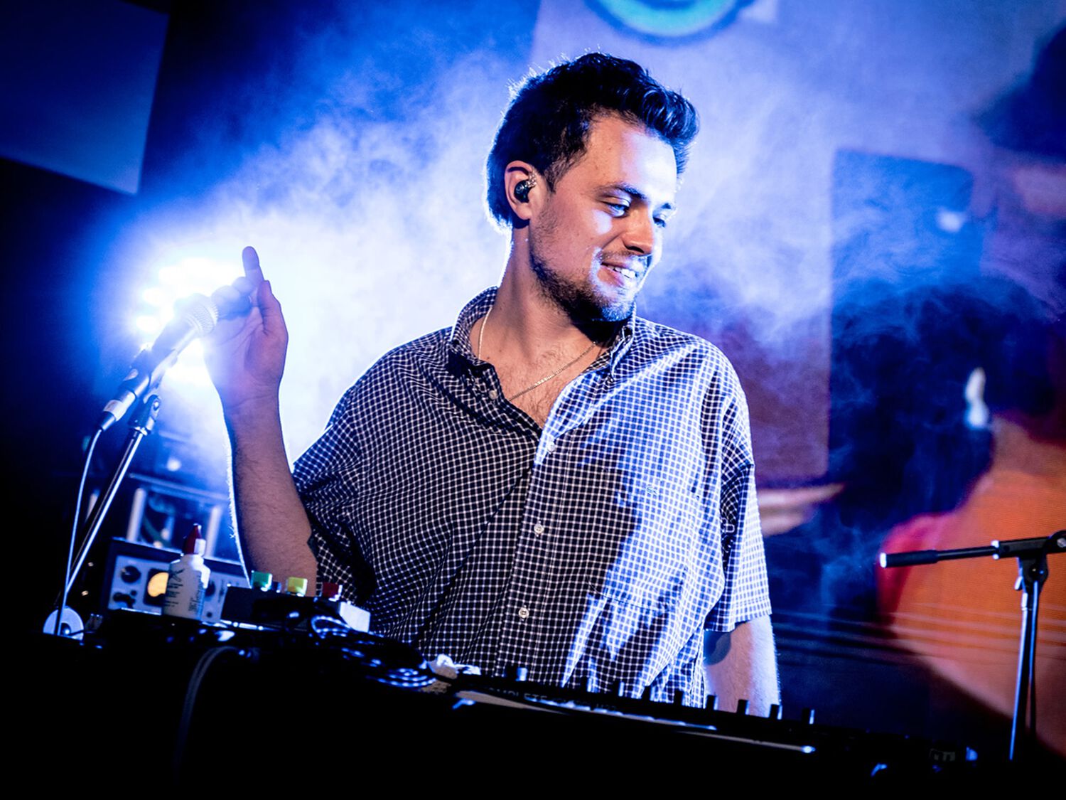Man on stay DJing