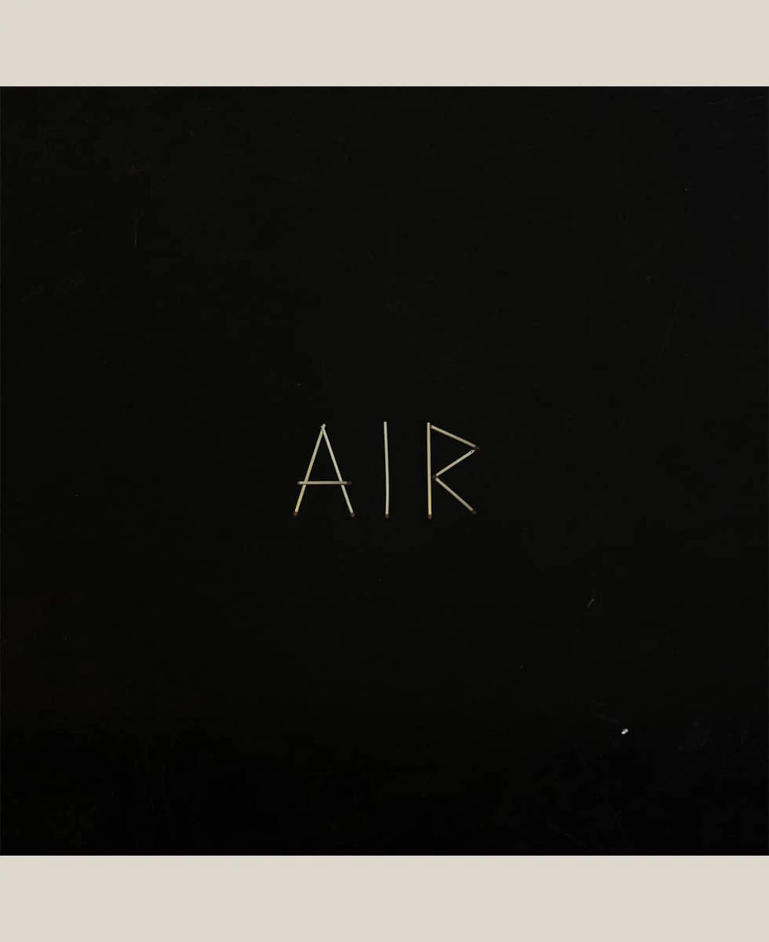 Black square with thin white text