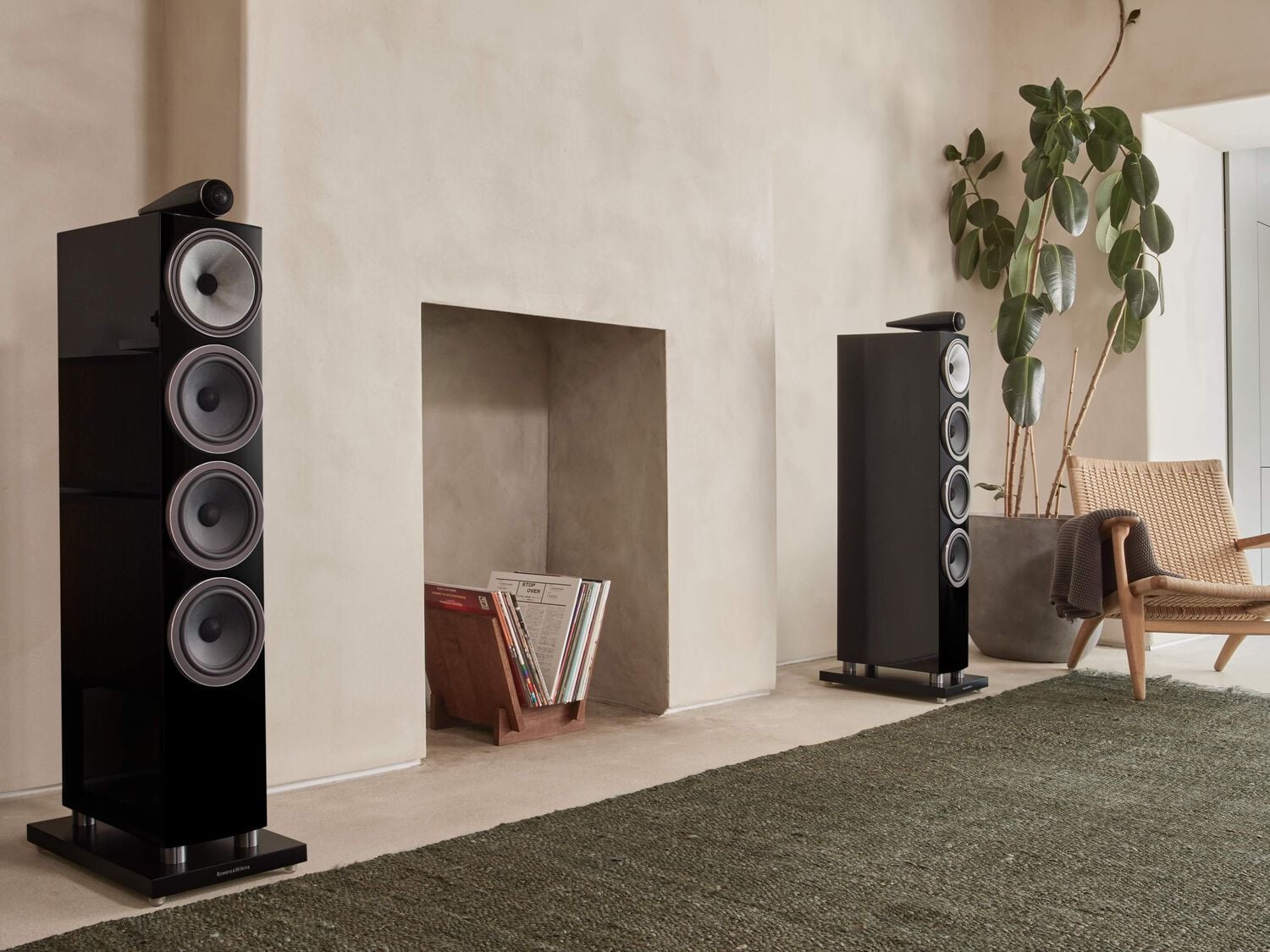 Black 700 series speakers in living room